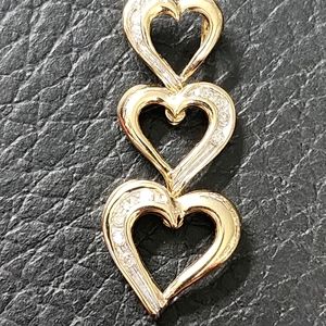 Beautiful triple heart pendant gold and diamonds